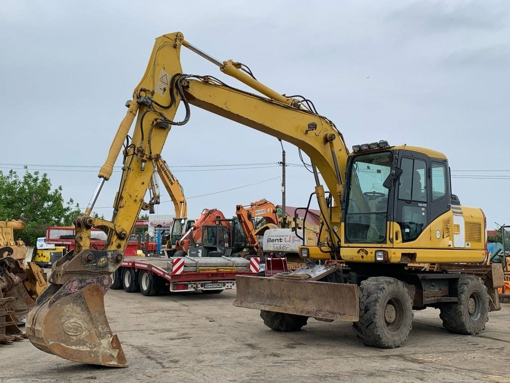 Komatsu PW 140-7 - Bager na kolesih: slika 1 Komatsu PW 140-7 - Bager na kolesih: slika 1