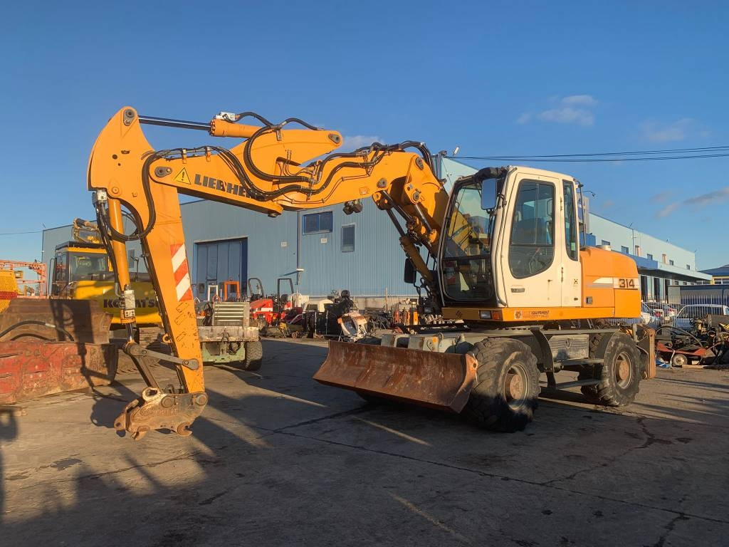 Liebherr A 314 Litronic - Bager na kolesih: slika 1 Liebherr A 314 Litronic - Bager na kolesih: slika 1