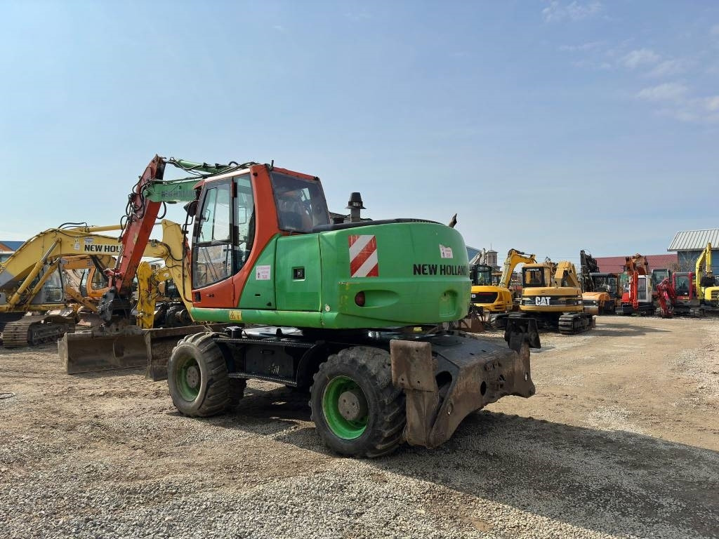 New Holland MH Plus - Bager na kolesih: slika 5 New Holland MH Plus - Bager na kolesih: slika 5