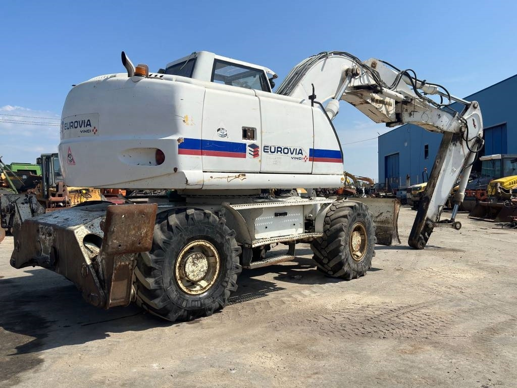 New Holland MH Plus - Bager na kolesih: slika 4 New Holland MH Plus - Bager na kolesih: slika 4