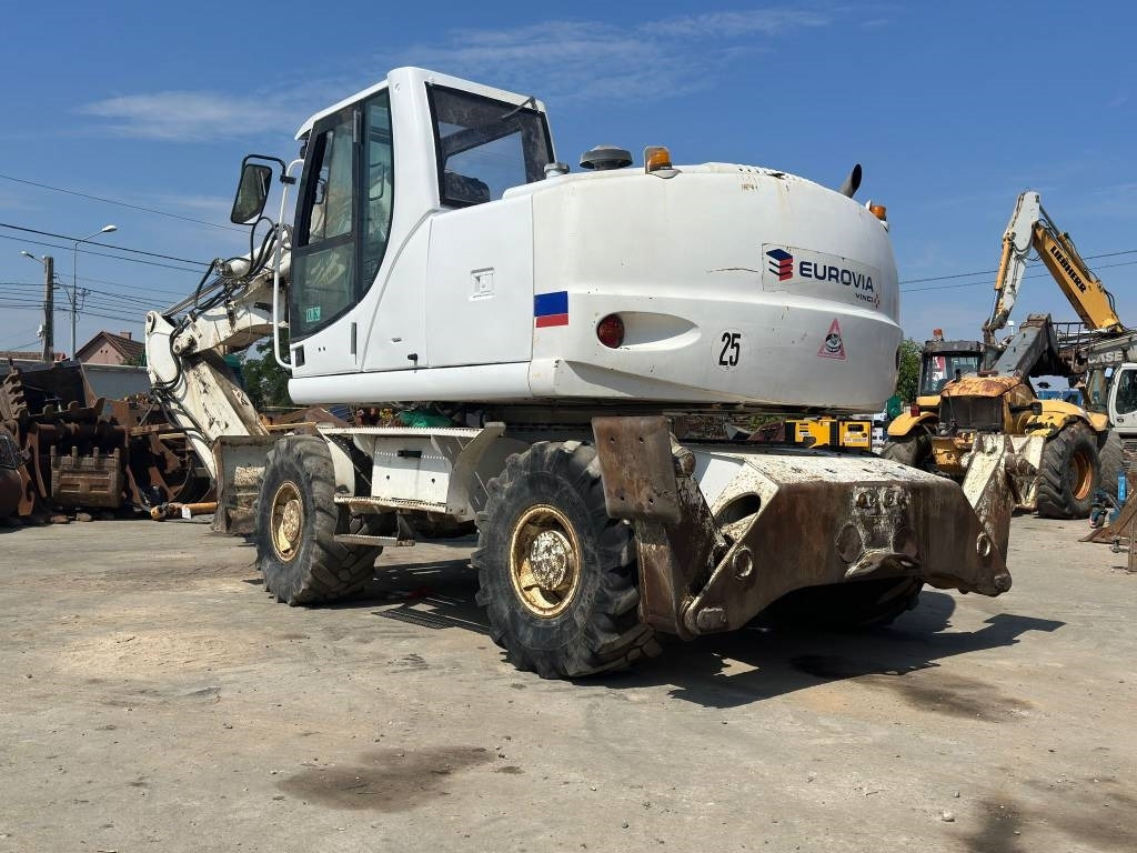 New Holland MH Plus - Bager na kolesih: slika 5 New Holland MH Plus - Bager na kolesih: slika 5