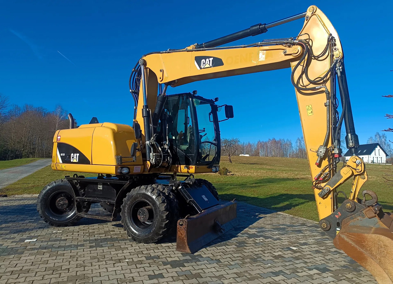 CATERPILLAR M313D - Bager na kolesih: slika 2 CATERPILLAR M313D - Bager na kolesih: slika 2