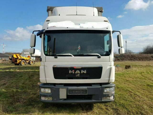 MAN TGL8.240 G.Haus/2xBett Klima AHK - Dostavno vozilo s ponjavo: slika 1 MAN TGL8.240 G.Haus/2xBett Klima AHK - Dostavno vozilo s ponjavo: slika 1