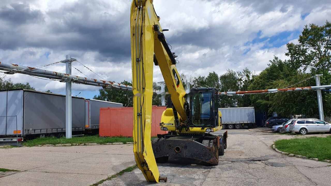 Caterpillar M 318 D MH - Bager za prekladanje primarnih/ Sekundarnih surovin: slika 4 Caterpillar M 318 D MH - Bager za prekladanje primarnih/ Sekundarnih surovin: slika 4