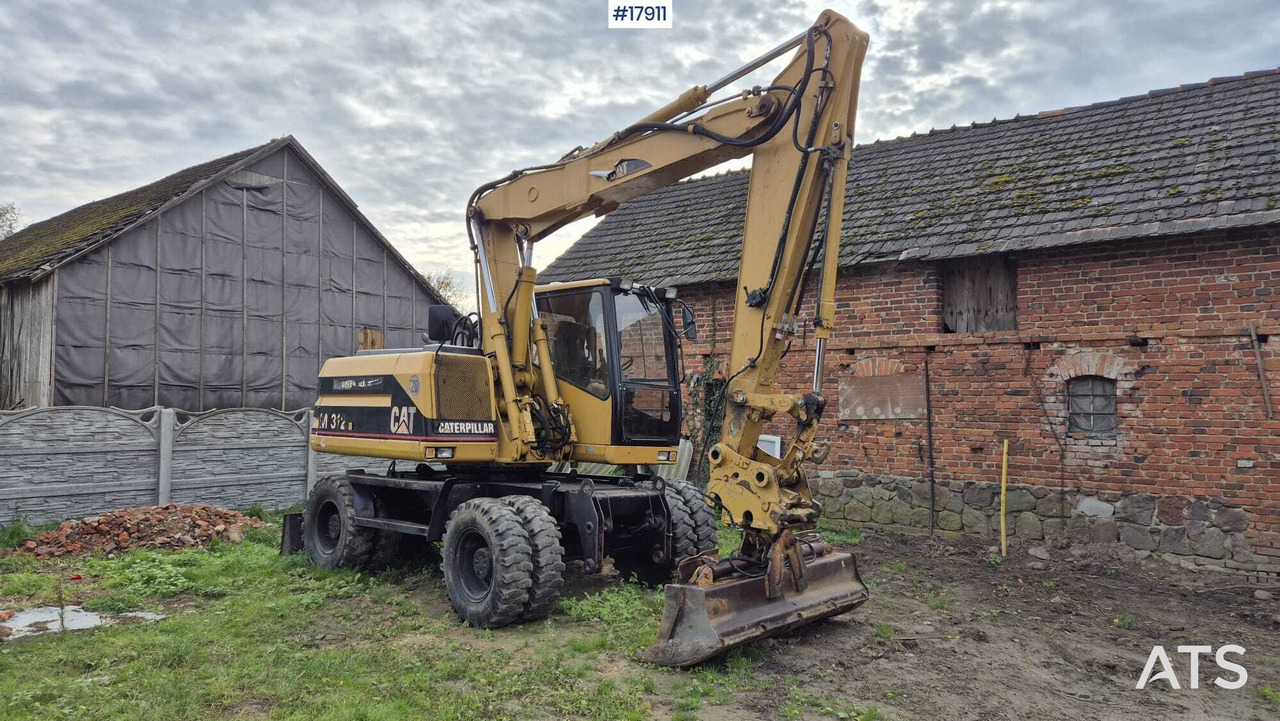 2000 CAT M312 - Bager na kolesih: slika 1 2000 CAT M312 - Bager na kolesih: slika 1
