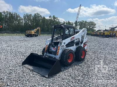 BOBCAT S740 - Mini nakladalec: slika 1 BOBCAT S740 - Mini nakladalec: slika 1