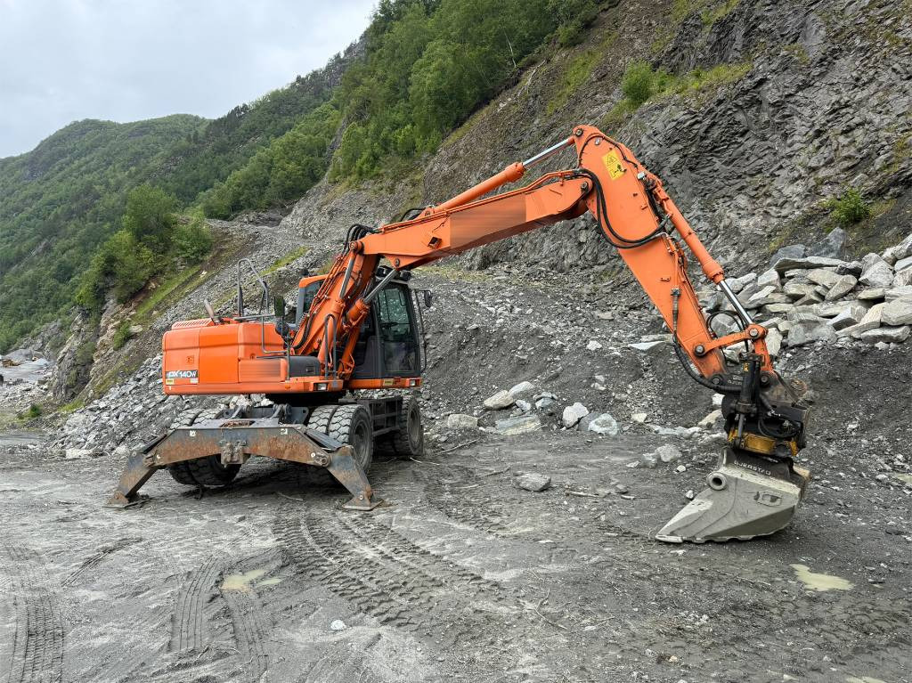 Doosan 140 W - Bager na kolesih: slika 2 Doosan 140 W - Bager na kolesih: slika 2