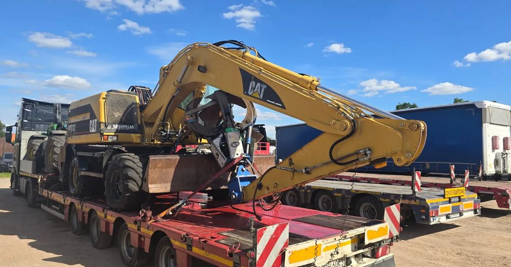 Caterpillar M312 - Bager na kolesih: slika 1 Caterpillar M312 - Bager na kolesih: slika 1
