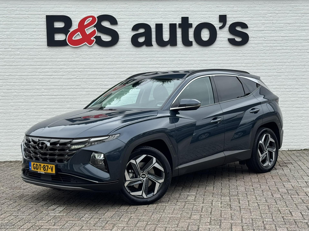 Hyundai Tucson-1.6 T-GDI PHEV Premium 4WD Trekhaak Leder + koeling en verwarming Led - SUV: slika 1 Hyundai Tucson-1.6 T-GDI PHEV Premium 4WD Trekhaak Leder + koeling en verwarming Led - SUV: slika 1