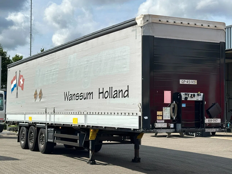 Schmitz Cargobull Schuifzeil met Borden / Disc-Brakes / Huckepack / Code XL / Apk - Polprikolica s ponjavo: slika 4 Schmitz Cargobull Schuifzeil met Borden / Disc-Brakes / Huckepack / Code XL / Apk - Polprikolica s ponjavo: slika 4