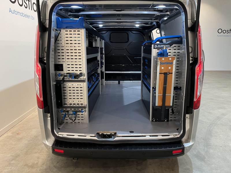 Ford Transit Custom 300 2.0 TDCI L2H1 Trend 130 PK Servicebus / Sortimo Inrichting / Euro 6 / Airco / Cruise Control / Klep / PDC / 3-Zits - Mali kombi: slika 4 Ford Transit Custom 300 2.0 TDCI L2H1 Trend 130 PK Servicebus / Sortimo Inrichting / Euro 6 / Airco / Cruise Control / Klep / PDC / 3-Zits - Mali kombi: slika 4