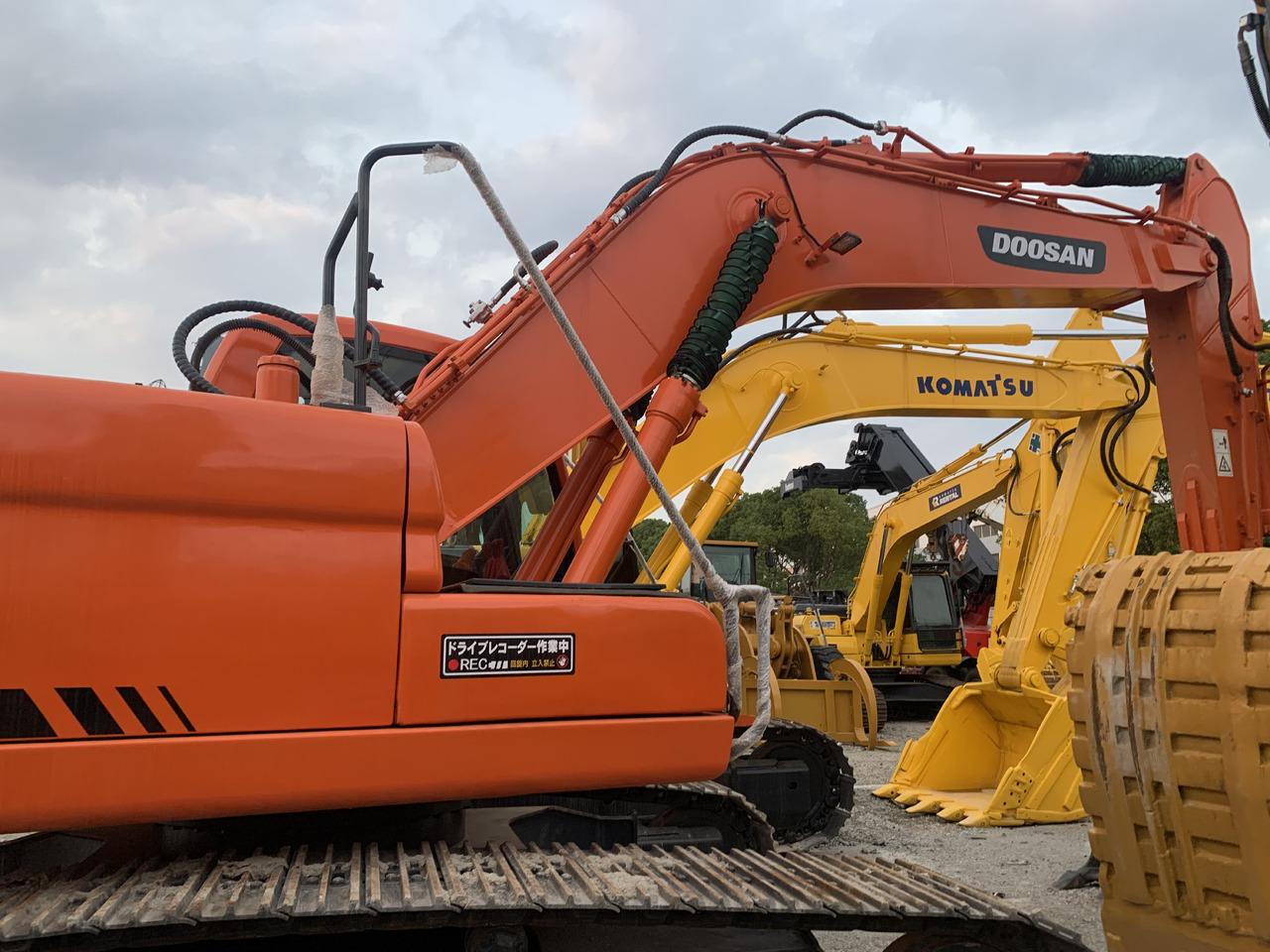 DOOSAN DX225LC - Bager na kolesih: slika 1 DOOSAN DX225LC - Bager na kolesih: slika 1