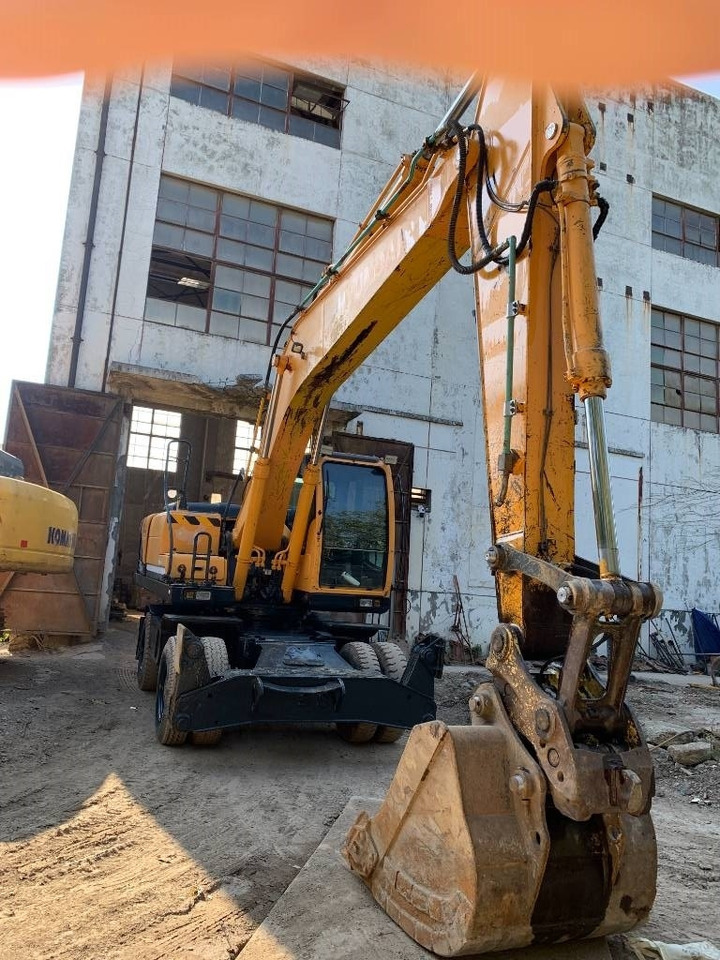 Hyundai R210W-9 - Bager na kolesih: slika 1 Hyundai R210W-9 - Bager na kolesih: slika 1