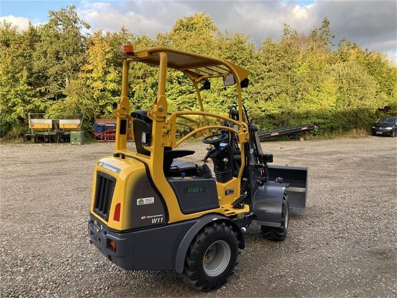 Eurotrac W11 med lang arm, skovl og gafler - Zgibni nakladalnik: slika 3 Eurotrac W11 med lang arm, skovl og gafler - Zgibni nakladalnik: slika 3