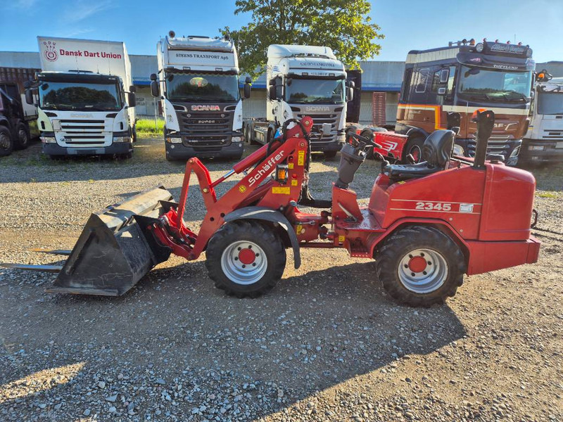 Schäffer 2345 (Bucket/Forks) - Kompaktni nakladalnik na gosenicah: slika 1 Schäffer 2345 (Bucket/Forks) - Kompaktni nakladalnik na gosenicah: slika 1