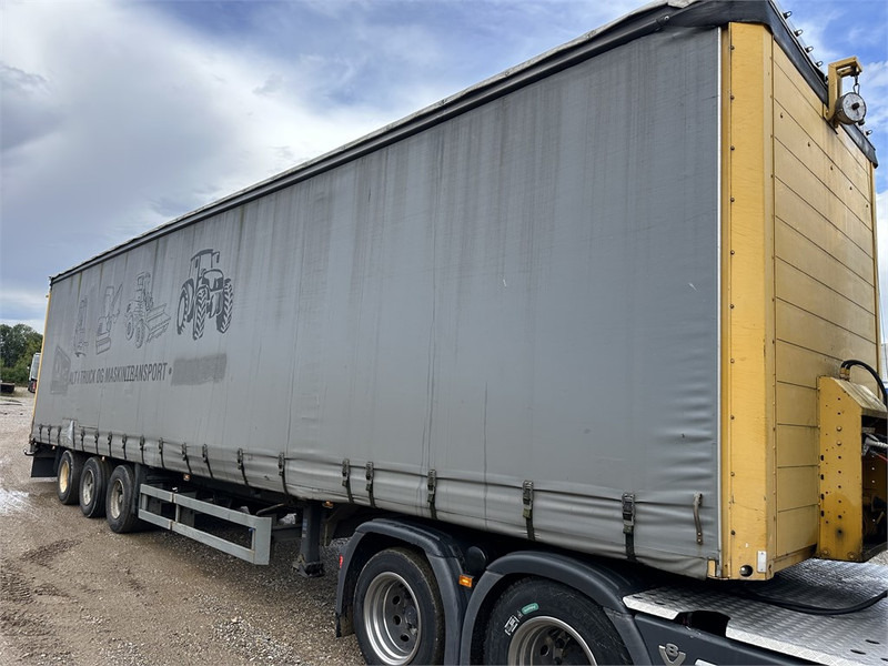 Schmitz Cargobull Machine transport trailer with bag ramp - Nizko noseča polprikolica: slika 4 Schmitz Cargobull Machine transport trailer with bag ramp - Nizko noseča polprikolica: slika 4