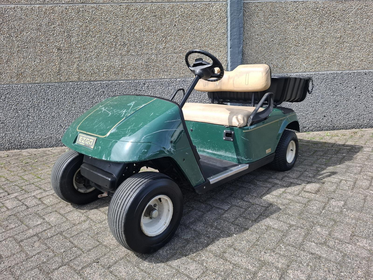 E-Z-GO TXT 2-Persoons Elektrische Golfkar met Open Laadbak 1442482 - Voziček za golf: slika 1 E-Z-GO TXT 2-Persoons Elektrische Golfkar met Open Laadbak 1442482 - Voziček za golf: slika 1