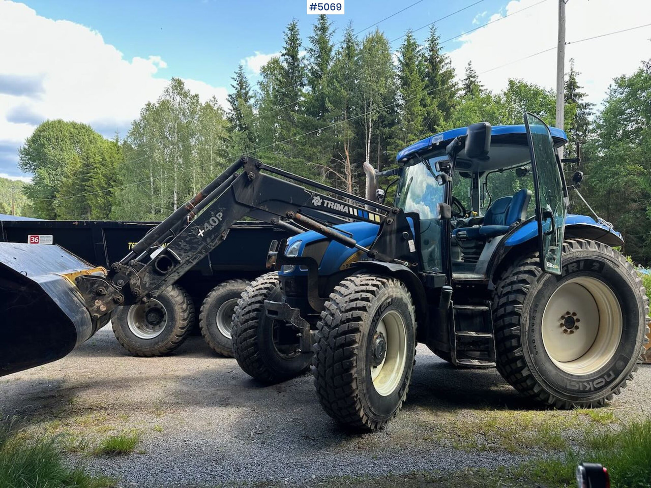 2009 New Holland T6040 SS w/ Trima front loader - Traktor: slika 1 2009 New Holland T6040 SS w/ Trima front loader - Traktor: slika 1