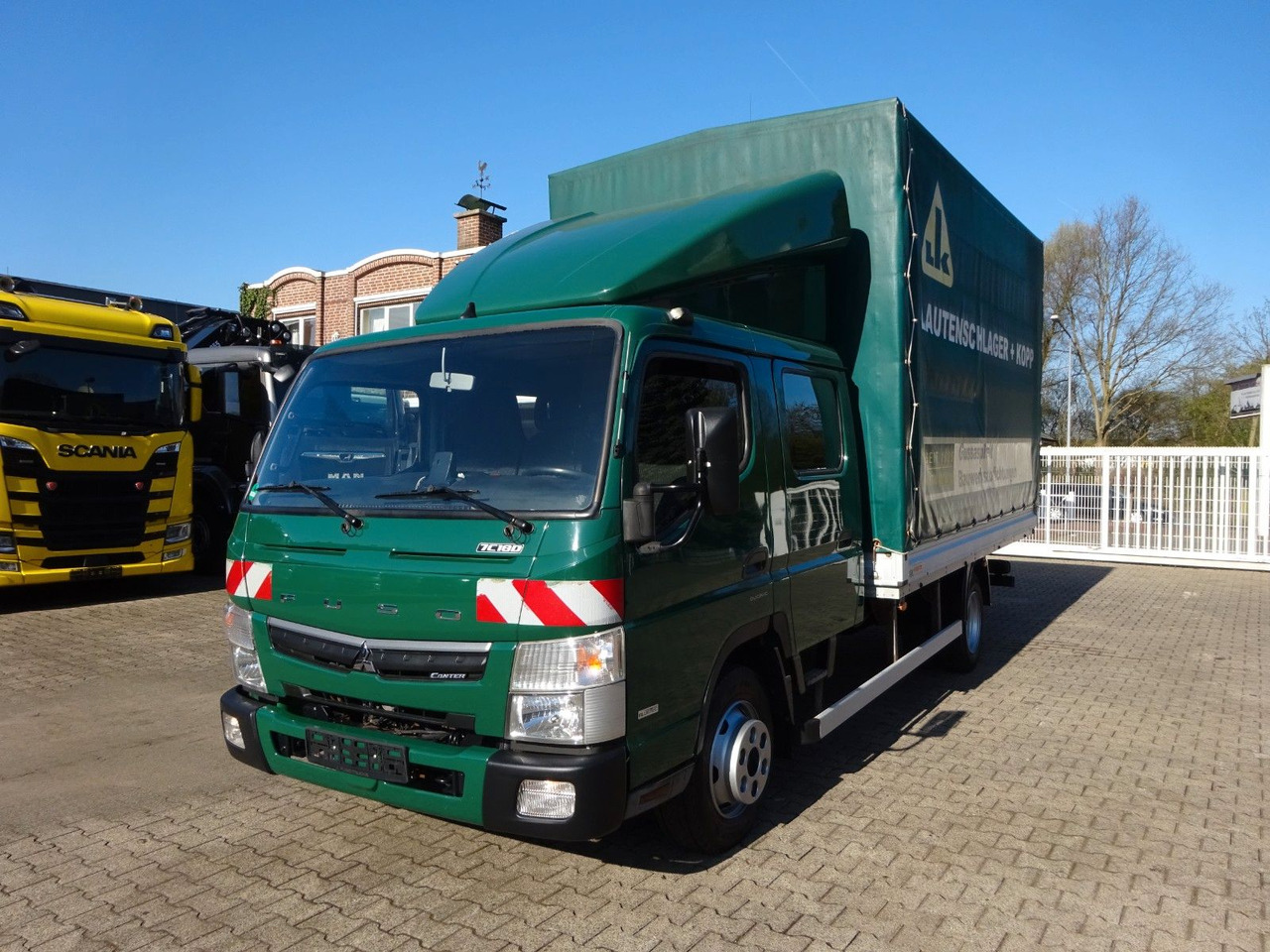 FUSO 7C180D Canter mit Doppelkabine 4x2 - Dostavno vozilo s ponjavo, Dostavno vozilo z dvojno kabino: slika 1 FUSO 7C180D Canter mit Doppelkabine 4x2 - Dostavno vozilo s ponjavo, Dostavno vozilo z dvojno kabino: slika 1