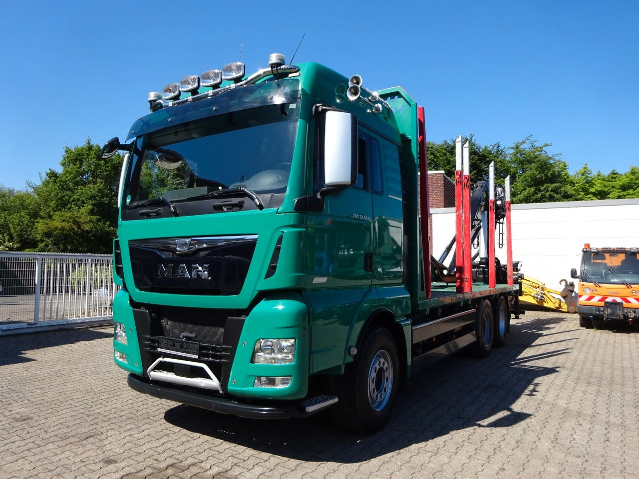 MAN 33.560 TGX mit TAJFUN L150Z Holzladekran 6x4 - Tovornjak za prevoz lesa, Tovornjak z dvigalom: slika 1 MAN 33.560 TGX mit TAJFUN L150Z Holzladekran 6x4 - Tovornjak za prevoz lesa, Tovornjak z dvigalom: slika 1