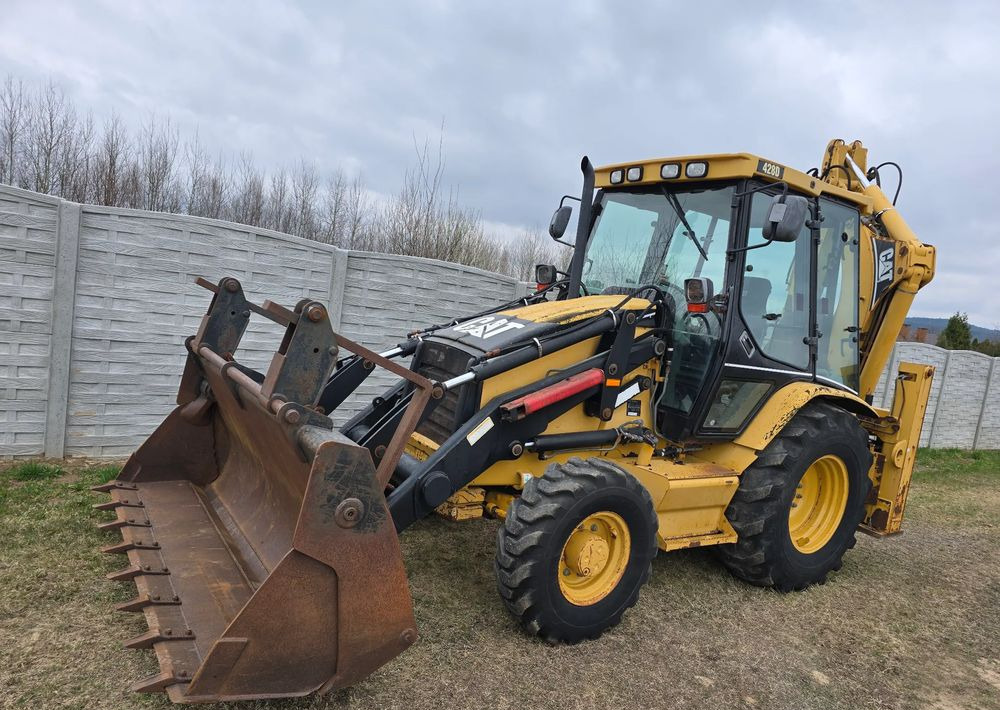 Caterpillar - Bager nakladalec: slika 1 Caterpillar - Bager nakladalec: slika 1