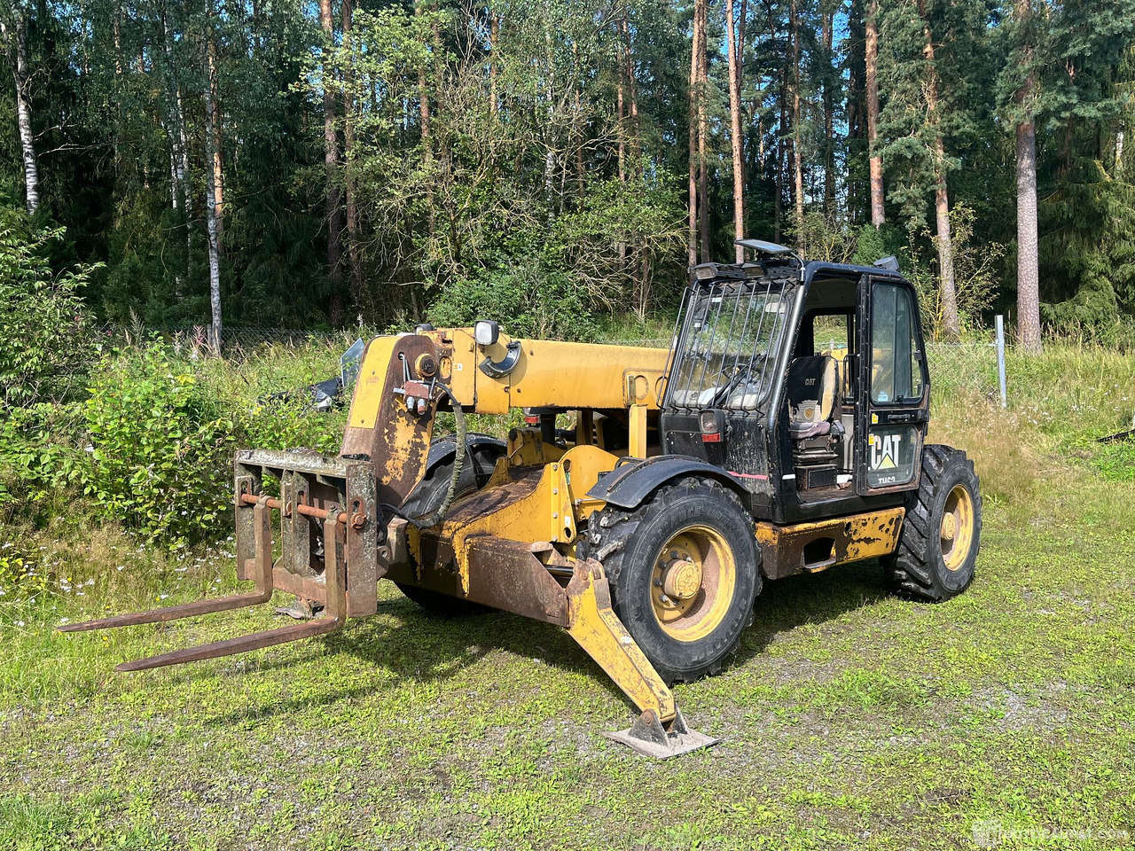 Caterpillar TH63, kurottaja piikeillä ja kauhalla, 2002, Loppi - Kmetijski stroj: slika 1 Caterpillar TH63, kurottaja piikeillä ja kauhalla, 2002, Loppi - Kmetijski stroj: slika 1