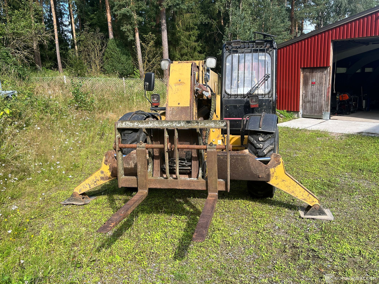 Caterpillar TH63, kurottaja piikeillä ja kauhalla, 2002, Loppi - Kmetijski stroj: slika 4 Caterpillar TH63, kurottaja piikeillä ja kauhalla, 2002, Loppi - Kmetijski stroj: slika 4