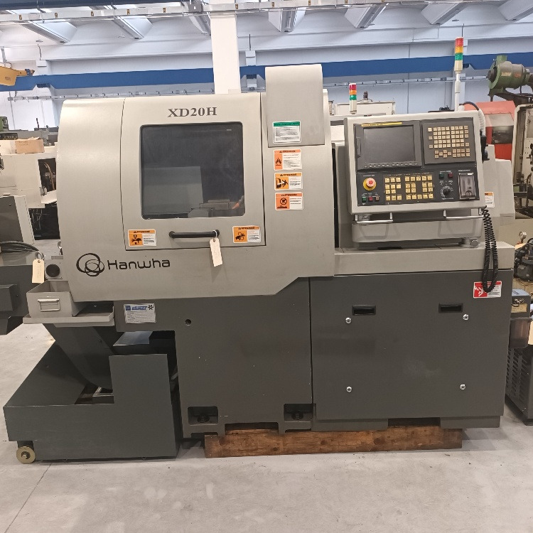 Tornio a fantina mobile a 5 assi Cnc Hanwha XD-20H - Stroj za obdelavo kovin: slika 1 Tornio a fantina mobile a 5 assi Cnc Hanwha XD-20H - Stroj za obdelavo kovin: slika 1