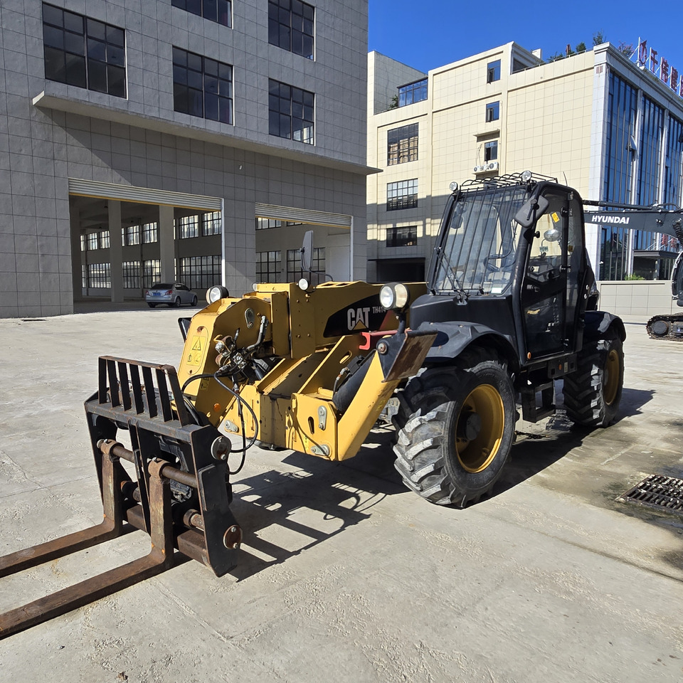 CATERPILLAR TH414 - Teleskopska dvižna ploščad: slika 5 CATERPILLAR TH414 - Teleskopska dvižna ploščad: slika 5