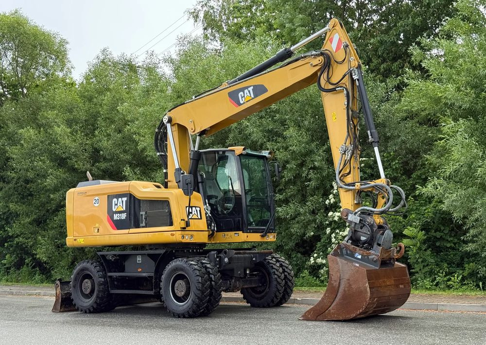 Caterpillar CAT 318 F * Powertilt * Sprowadzony* 9700 MTG * Caterpillar * Stan Perfekcyjny - Bager na kolesih: slika 2 Caterpillar CAT 318 F * Powertilt * Sprowadzony* 9700 MTG * Caterpillar * Stan Perfekcyjny - Bager na kolesih: slika 2