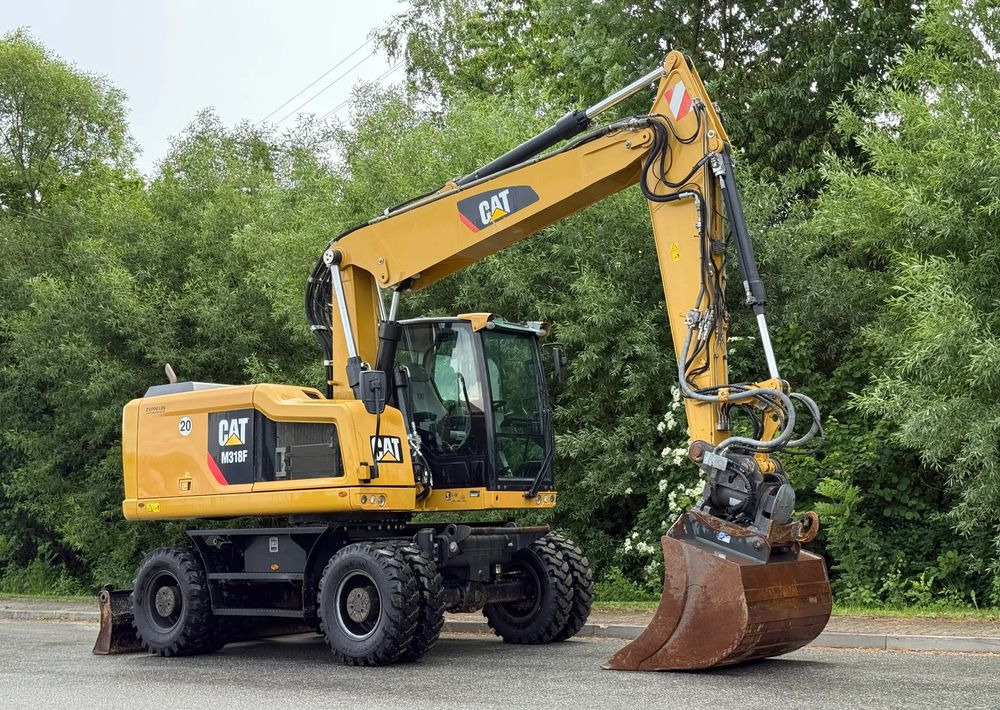 Caterpillar CAT 318 F * Powertilt * Sprowadzony* 9700 MTG * Caterpillar * Stan Perfekcyjny - Bager na kolesih: slika 2 Caterpillar CAT 318 F * Powertilt * Sprowadzony* 9700 MTG * Caterpillar * Stan Perfekcyjny - Bager na kolesih: slika 2