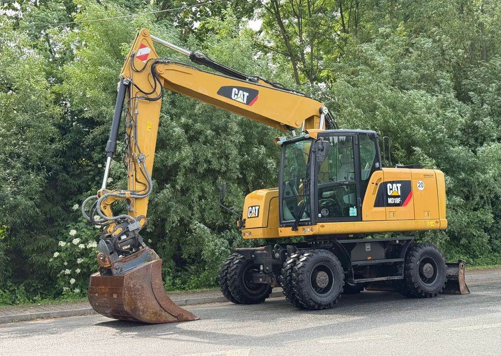 Caterpillar CAT 318 F * Powertilt * Sprowadzony* 9700 MTG * Caterpillar * Stan Perfekcyjny - Bager na kolesih: slika 1 Caterpillar CAT 318 F * Powertilt * Sprowadzony* 9700 MTG * Caterpillar * Stan Perfekcyjny - Bager na kolesih: slika 1