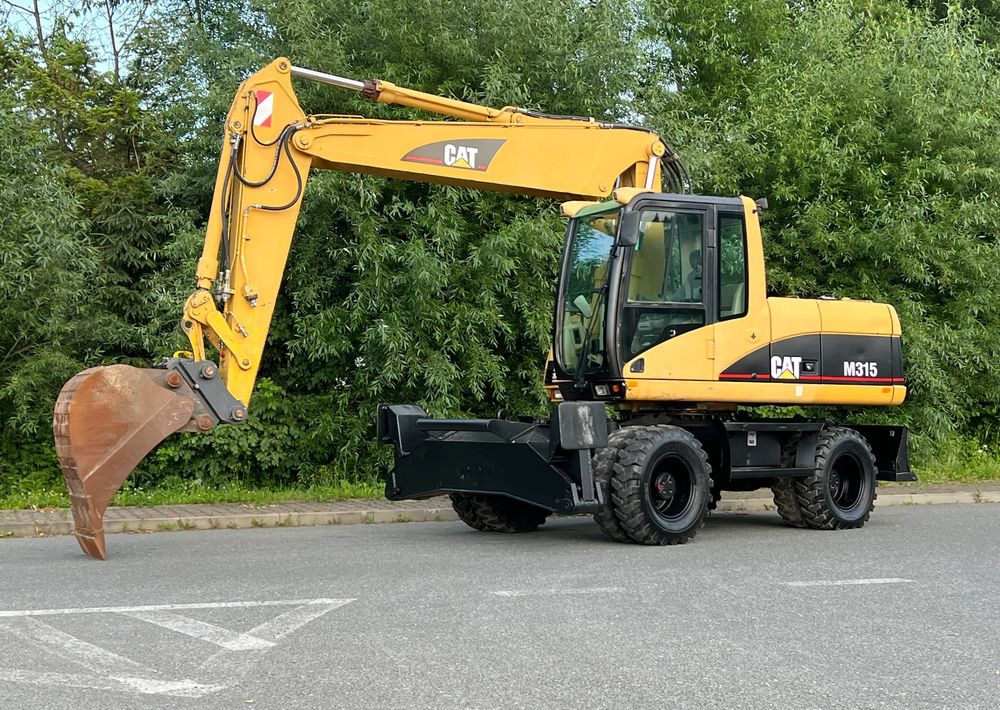 Caterpillar CAT M315C CATERPILLAR SPROWADZONY Bardzo Dobry Stan - Bager na kolesih: slika 2 Caterpillar CAT M315C CATERPILLAR SPROWADZONY Bardzo Dobry Stan - Bager na kolesih: slika 2