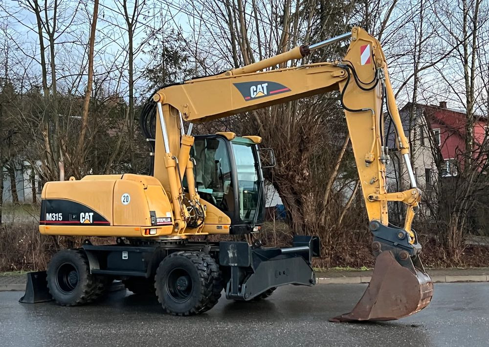 Caterpillar CAT M315C CATERPILLAR SPROWADZONY Bardzo Dobry Stan - Bager na kolesih: slika 2 Caterpillar CAT M315C CATERPILLAR SPROWADZONY Bardzo Dobry Stan - Bager na kolesih: slika 2