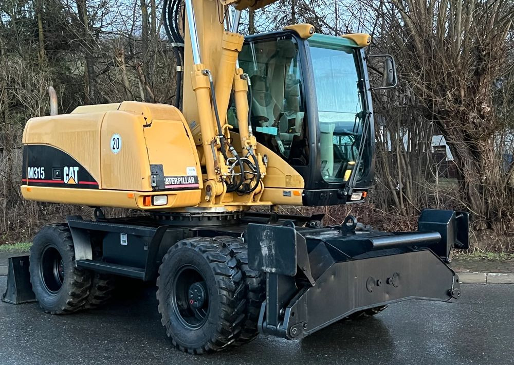 Caterpillar CAT M315C CATERPILLAR SPROWADZONY Bardzo Dobry Stan - Bager na kolesih: slika 5 Caterpillar CAT M315C CATERPILLAR SPROWADZONY Bardzo Dobry Stan - Bager na kolesih: slika 5