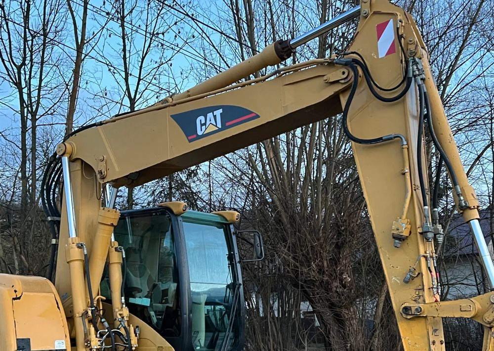 Caterpillar CAT M315C CATERPILLAR SPROWADZONY Bardzo Dobry Stan - Bager na kolesih: slika 4 Caterpillar CAT M315C CATERPILLAR SPROWADZONY Bardzo Dobry Stan - Bager na kolesih: slika 4