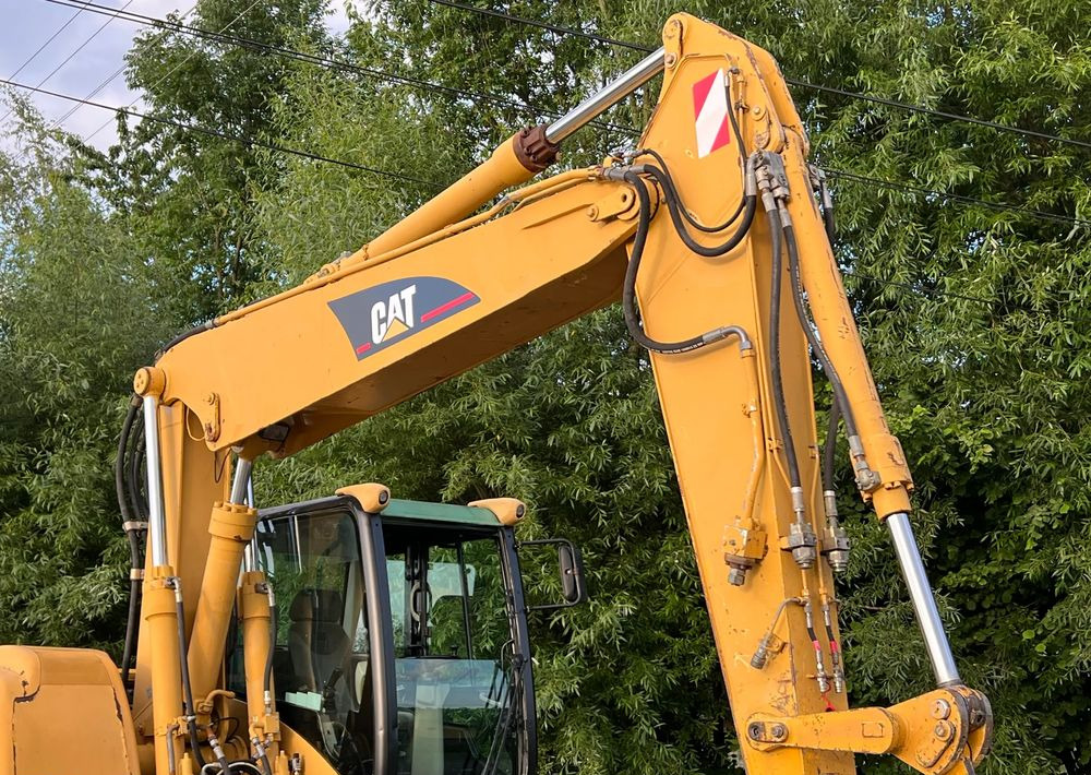 Caterpillar CAT M315C CATERPILLAR SPROWADZONY Bardzo Dobry Stan - Bager na kolesih: slika 4 Caterpillar CAT M315C CATERPILLAR SPROWADZONY Bardzo Dobry Stan - Bager na kolesih: slika 4