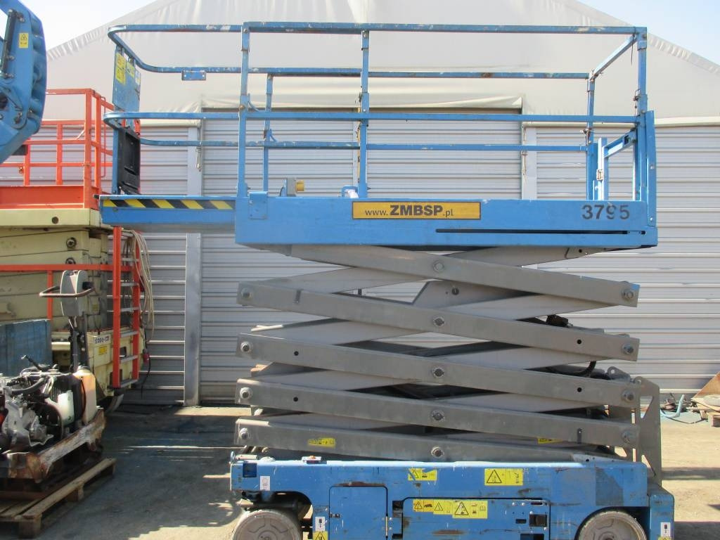 Genie GS 3232 - Škarjasta dvižna ploščad: slika 1 Genie GS 3232 - Škarjasta dvižna ploščad: slika 1