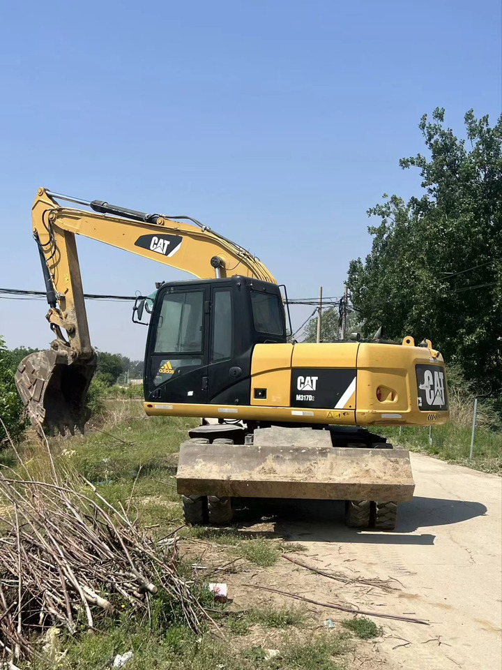 CATERPILLAR M317D2 - Bager na kolesih: slika 4 CATERPILLAR M317D2 - Bager na kolesih: slika 4