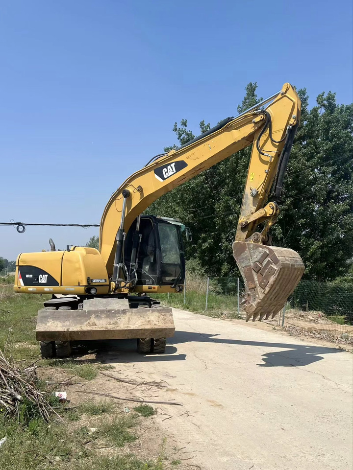 CATERPILLAR M317D2 - Bager na kolesih: slika 5 CATERPILLAR M317D2 - Bager na kolesih: slika 5