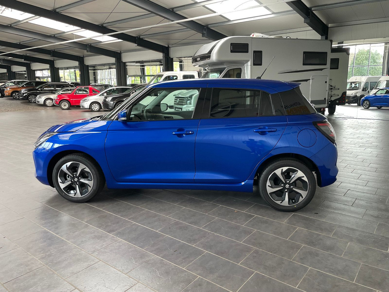 Suzuki Swift 1.2 DUALJET HYBRID Comfort+ - Avtomobil: slika 5 Suzuki Swift 1.2 DUALJET HYBRID Comfort+ - Avtomobil: slika 5