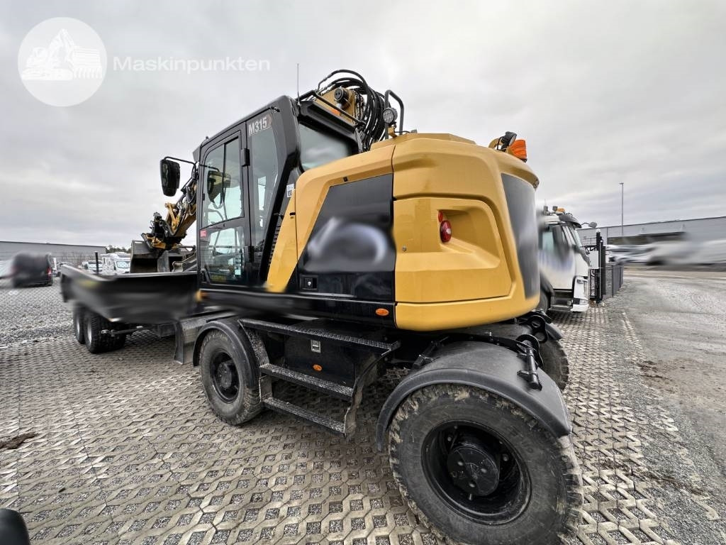 CAT M 315 - Bager na kolesih: slika 2 CAT M 315 - Bager na kolesih: slika 2