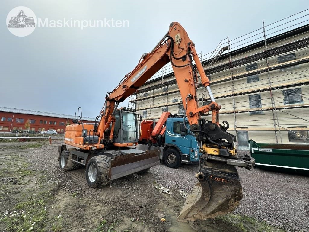 Doosan DX 140 W med vagn och redskap - Bager na kolesih: slika 2 Doosan DX 140 W med vagn och redskap - Bager na kolesih: slika 2