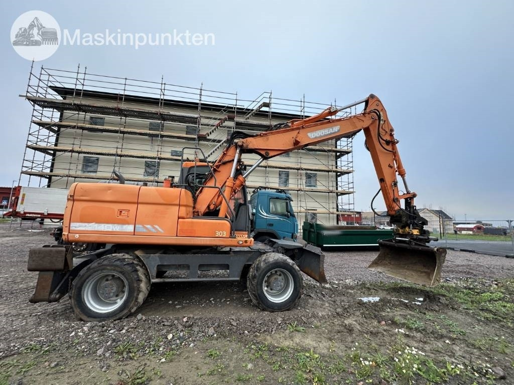 Doosan DX 140 W med vagn och redskap - Bager na kolesih: slika 3 Doosan DX 140 W med vagn och redskap - Bager na kolesih: slika 3