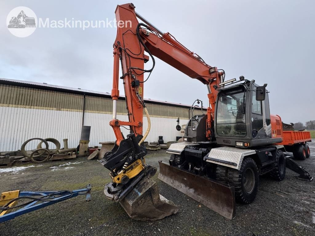 Hitachi ZX 140 W-3 Med vagn och redskap! - Bager na kolesih: slika 1 Hitachi ZX 140 W-3 Med vagn och redskap! - Bager na kolesih: slika 1