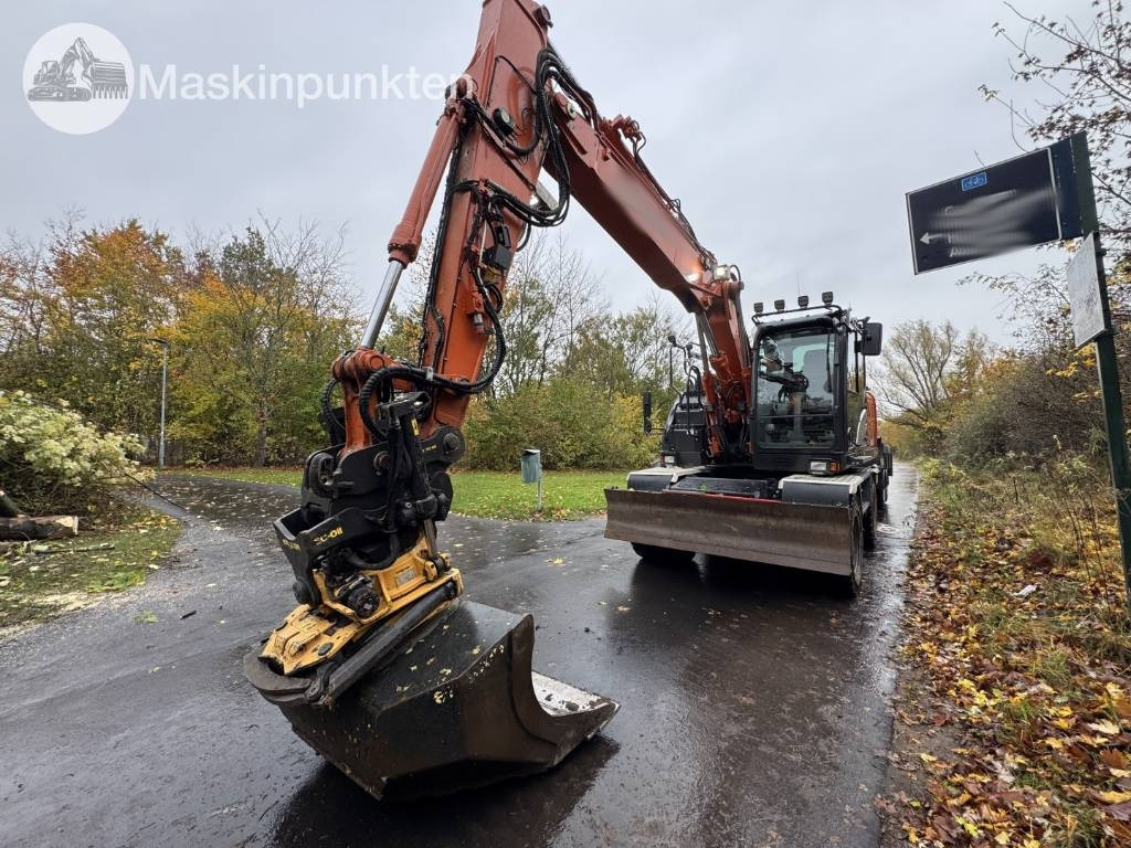 Bager na kolesih Hitachi ZX 140 W-6 Tippvagn med redskap: slika 1
