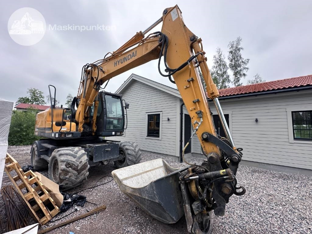 Hyundai Robex 140 W-7 A - Bager na kolesih: slika 3 Hyundai Robex 140 W-7 A - Bager na kolesih: slika 3
