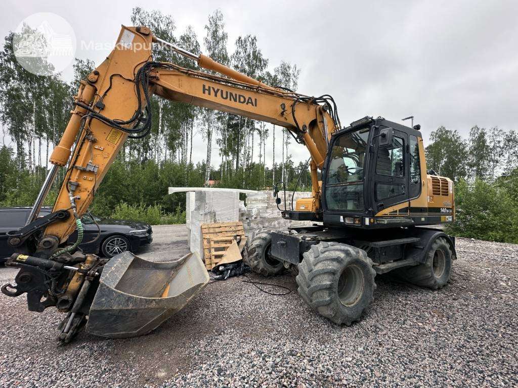 Hyundai Robex 140 W-7 A - Bager na kolesih: slika 1 Hyundai Robex 140 W-7 A - Bager na kolesih: slika 1