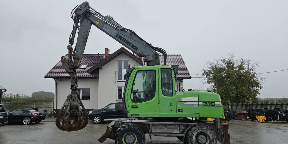 Koparka kołowa Liebherr A 316 Litronic chwytak podpory pług - Bager na kolesih: slika 1 Koparka kołowa Liebherr A 316 Litronic chwytak podpory pług - Bager na kolesih: slika 1