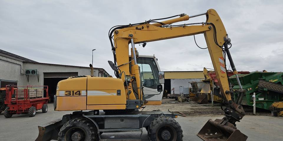 Koparka kołowa Liebherr A314 Litronic 9350 h 4 łyżki kołówka - Bager na kolesih: slika 5 Koparka kołowa Liebherr A314 Litronic 9350 h 4 łyżki kołówka - Bager na kolesih: slika 5